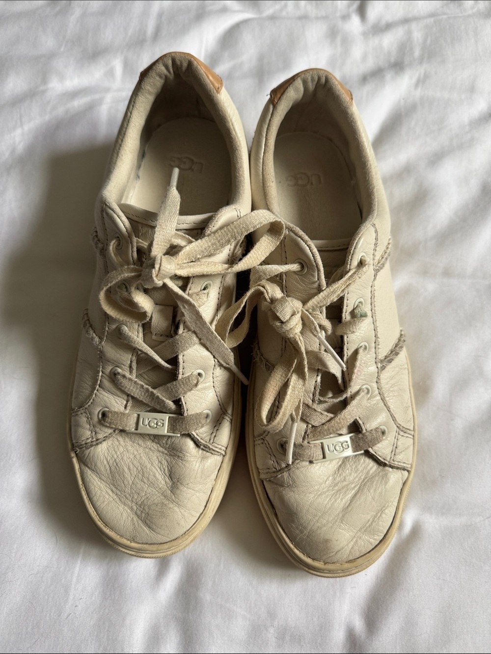 UGG women’s Cream Leather Low-Top Lace Sneakers